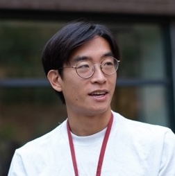 Photo of a man with glasses